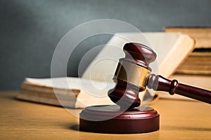 Wooden gavel with book close up