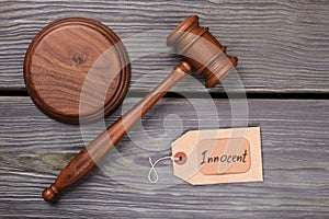Wooden gavel and innocent verdict.