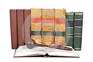 Wooden gavel and law books