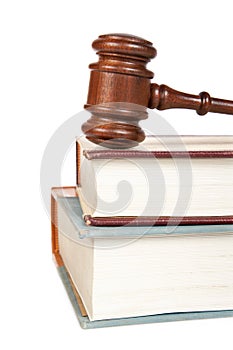 Wooden gavel and law books