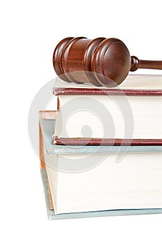 Wooden gavel and law books