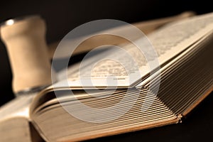 Wooden gavel and old law book