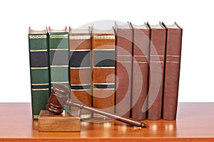 Wooden gavel and old law books