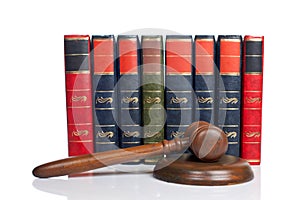 Wooden gavel and old law books