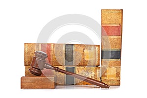 Wooden gavel and old law books