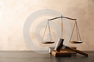 Wooden gavel with scales of justice and book