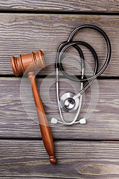 Wooden gavel and stethoscope.