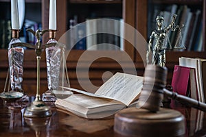 Wooden gavel on wooden table,legal books background