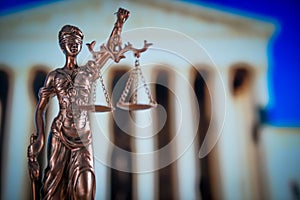 Wooden gavel on wooden table,legal books background