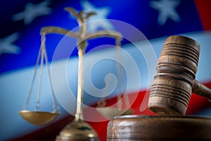 Wooden gavel on wooden table,legal books background