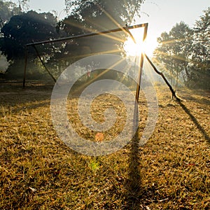 Wooden Goal on Field and Sunbeam in Morning