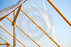 Wooden greenhouse covered with polyethylene