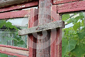 Wooden greenhouse door holder