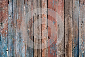 Wooden grey background. Brown, grey, red, blue wood texture.