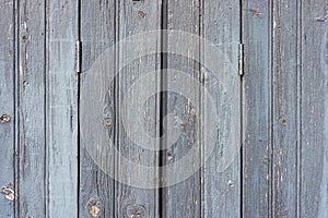 Wooden grey blue background vertical painted shutters .