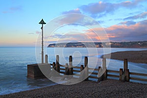 Wooden groyne on the beach