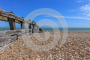 Wooden groyne on a stoney beach