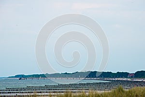 Wooden groynes at baltic sea, germany