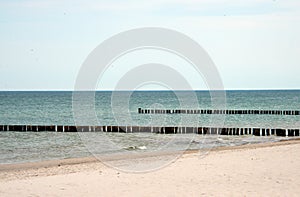 Wooden groynes at baltic sea, germany