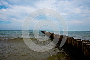 Wooden groynes at baltic sea, germany