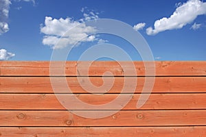 Wooden Grungy Fence and cloudy sky,