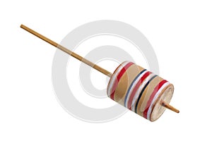 Wooden gyroscopes spinning isolated on white