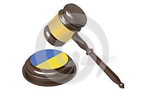 Wooden hammer gavel with flag of Ukraine