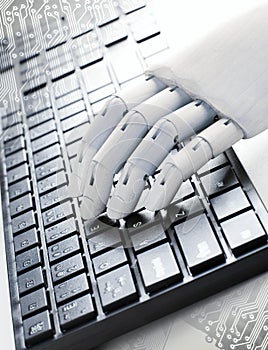 A wooden hand is typing