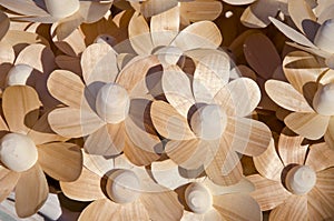 Wooden handmade craft flowers in market