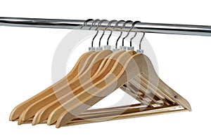 Wooden hangers with sizes tags isolated on white background