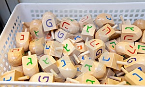 Wooden hanukkah Dreidels Sevivon for sale at Jerusalem street market