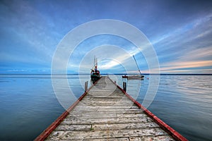 Wooden haven in the bay of Puck and boat