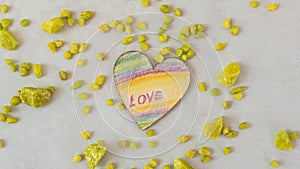 A rainbow heart made of wood photo