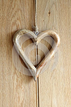 Wooden heart on wood