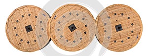 Wooden heavy cable reels, three vintage wood bobbins, electric fiber optic cables drums, electrical wires spools, steel wire