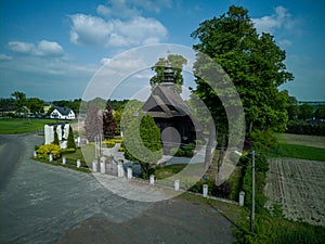 A wooden, historic church in the village of Suchcice, Poland.