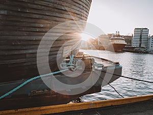 Wooden historic viking boat in a beautiful warm sunset