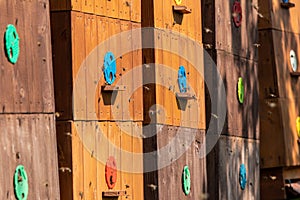 Wooden hive and flying honey bees