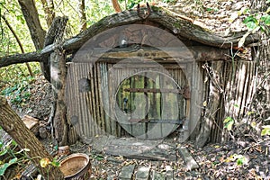 Wooden hobbit house made for children games photo