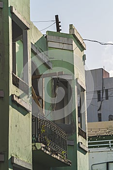 Wooden hoist on balcony of old historic building in Puerto Rico