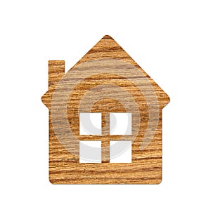 Wooden home icon from grass background, isolated on white