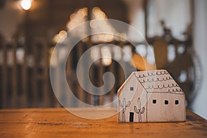 Wooden home model on wood table