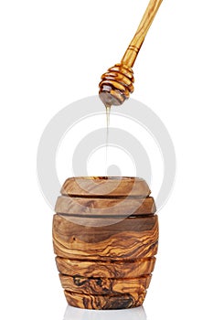 Wooden honey pot with dipper