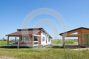 Wooden house and barn in countryside