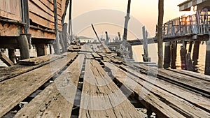 Wooden house and bridge in the fisheries village in Thailand