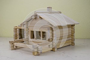 Wooden house from the children's designer