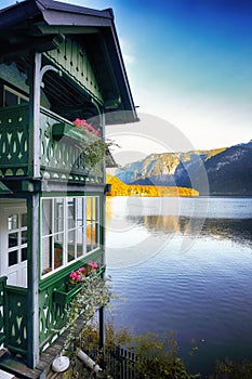 Wooden house on the coast of lake in Hallstatt village Austrian