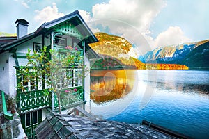 Wooden house on the coast of lake in Hallstatt village Austrian