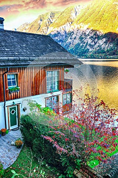 Wooden house on the coast of lake in Hallstatt village Austrian