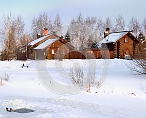 Wooden house in the country village in winter